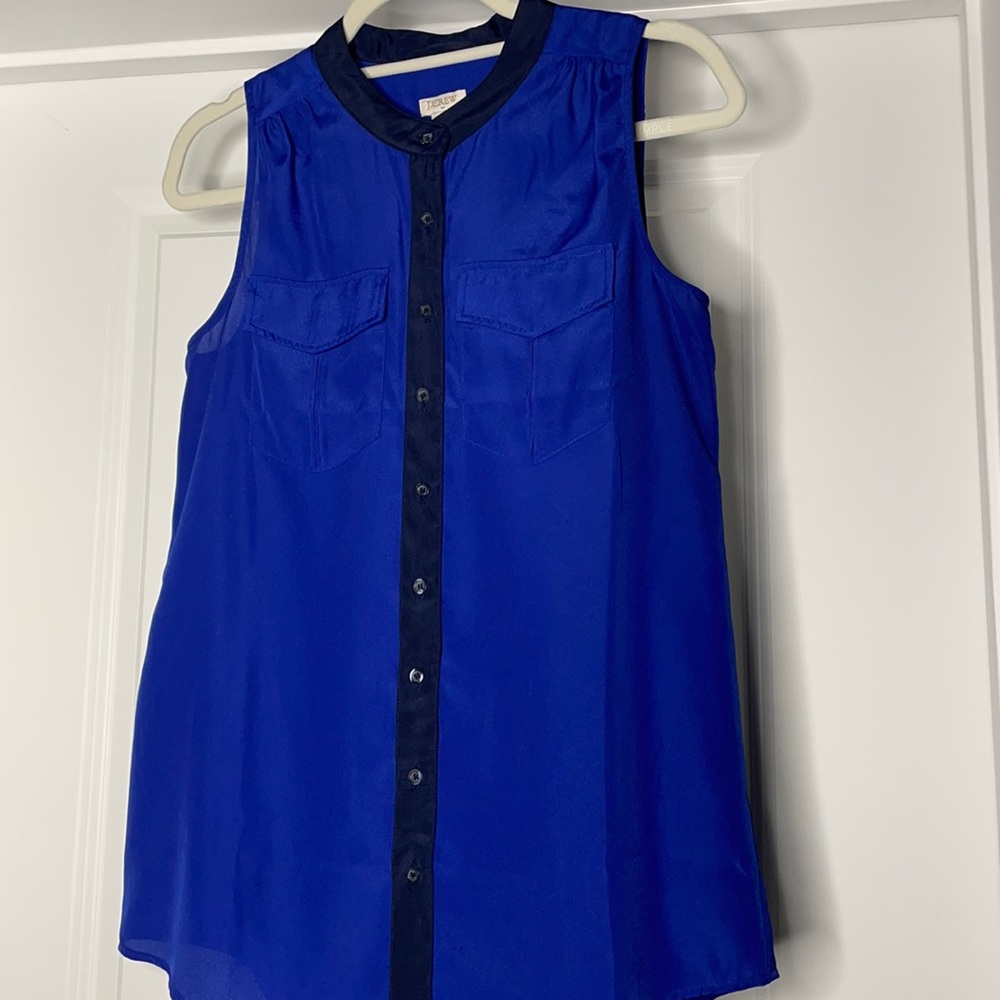 JCREW SLEEVELESS BUTTON DOWN SIZE 0. BLUE AND BLACK.